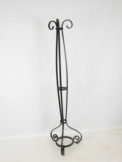 LAMP STAND in wrought iron resting on a tripod...
