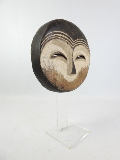 KWELE MASK. Wood and pigments. Dim 27 x 28...