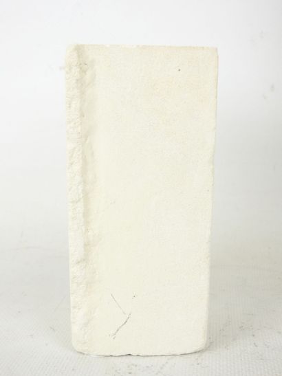 FACE sculpted from a block of plaster. Signed...