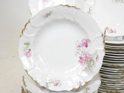LIMOGES: Part of a porcelain dinner service...