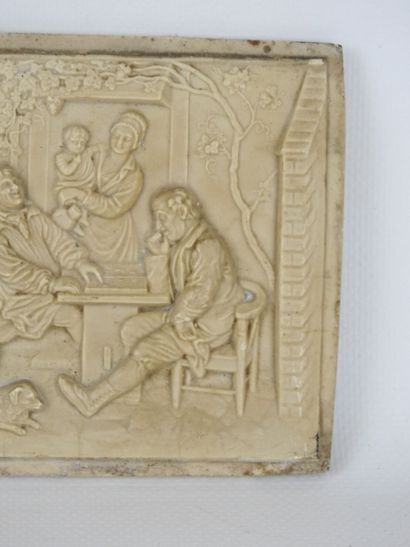 Low-relief plaque in petrified stone, decorated...