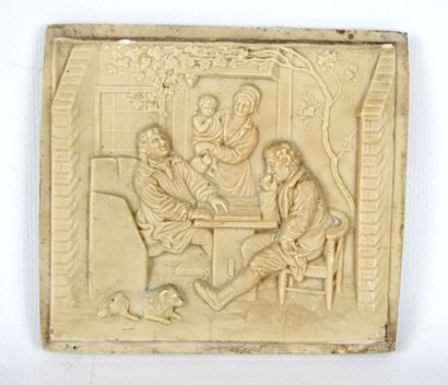 Low-relief plaque in petrified stone, decorated...