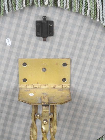Gilded, twisted wrought-iron tilt-top GUERIDON,...