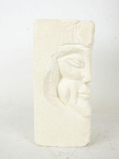 FACE sculpted from a block of plaster. Signed...