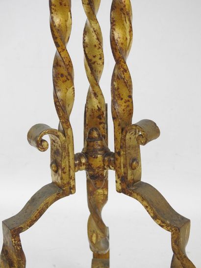 Gilded, twisted wrought-iron tilt-top GUERIDON,...