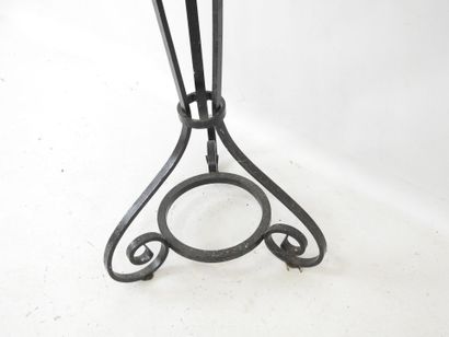 LAMP STAND in wrought iron resting on a tripod...
