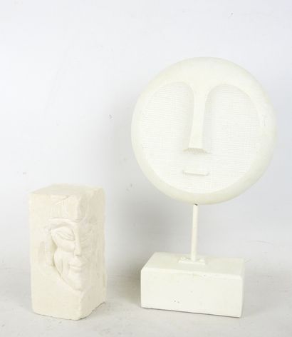 FACE sculpted from a block of plaster. Signed...