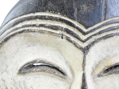 KWELE MASK. Wood and pigments. Dim 27 x 28...