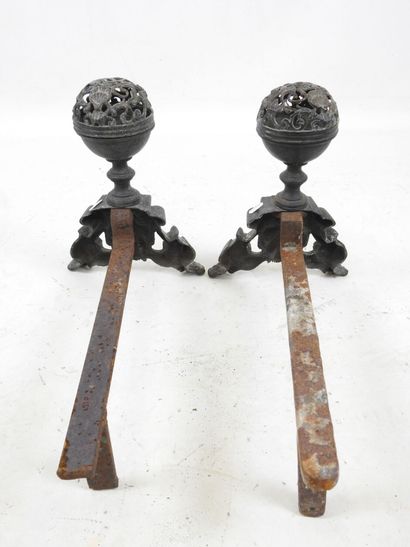 Pair of cast-iron CHENETS resting on two...
