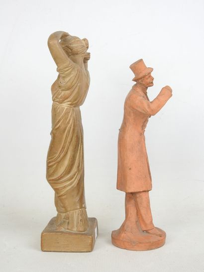 FEMALE à l'Antique styling her hair, terracotta...