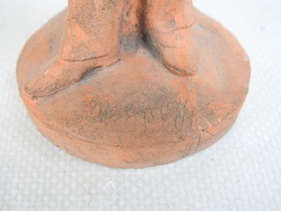 FEMALE à l'Antique styling her hair, terracotta...