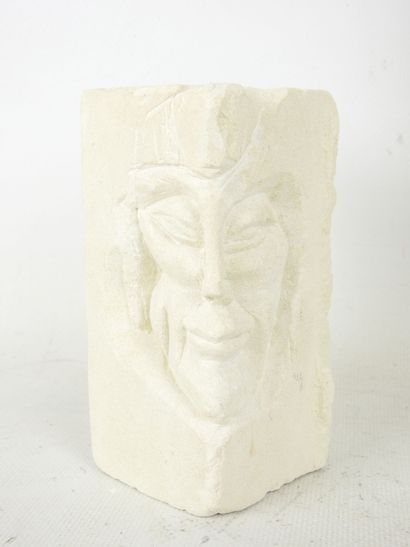 FACE sculpted from a block of plaster. Signed...