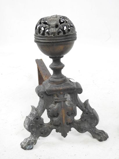 Pair of cast-iron CHENETS resting on two...