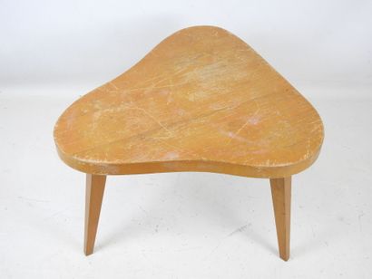 LOW TABLE in beech, the three-lobed top resting...