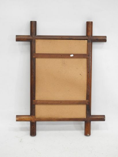 Rectangular mirror with wood surround. Work...