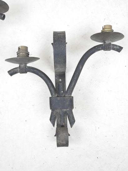 Two wrought-iron APPLIQUES with two asymmetrical...