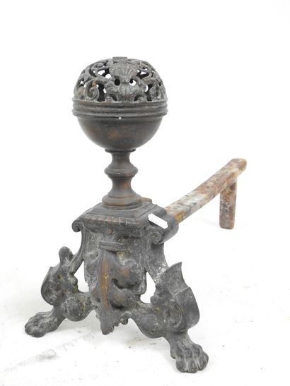 Pair of cast-iron CHENETS resting on two...