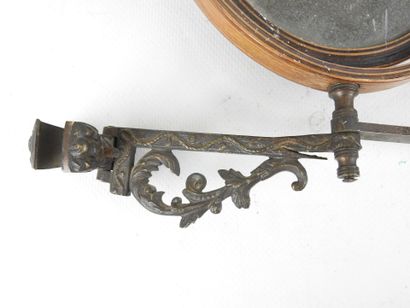 TWO double wooden mirrors resting on an articulated...