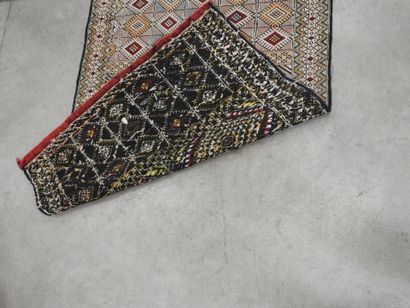 MOROCCO : Woven carpet in black, white and...