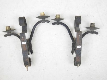 Two wrought-iron APPLIQUES with two asymmetrical...