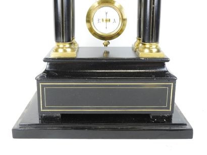Black lacquered wood and gilt brass portico...