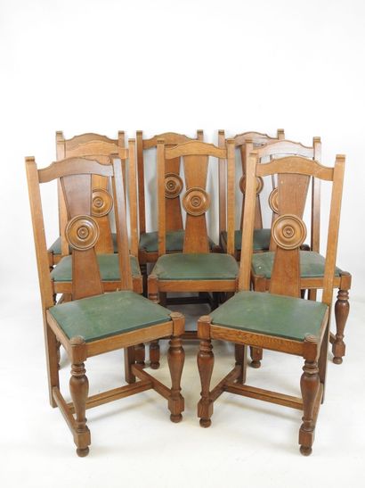 EIGHT wooden CHAIRS resting on four baluster...