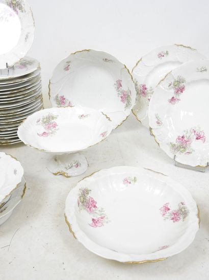 LIMOGES: Part of a porcelain dinner service...