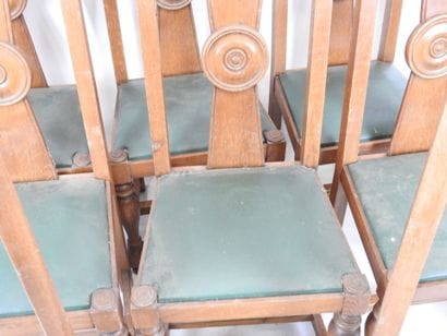 EIGHT wooden CHAIRS resting on four baluster...