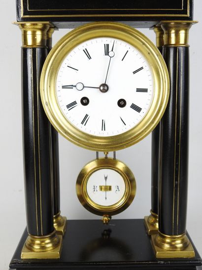Black lacquered wood and gilt brass portico...