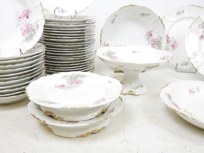 LIMOGES: Part of a porcelain dinner service...