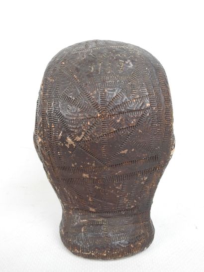 FACE of a blower in terra cotta with brown...
