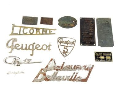 TWELVE automotive PLATES and INSIGNES including:...