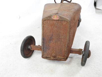 EUREKA: Pedal car in red painted sheet metal....