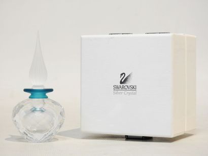 SWAROVSKI
Blue-tinted translucent crystal...