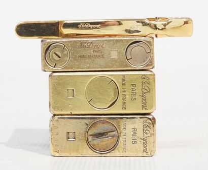 S.T DUPONT 
Lot including 3 gilt metal and...