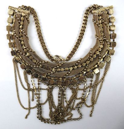 Important collier ras du cou en métal doré...