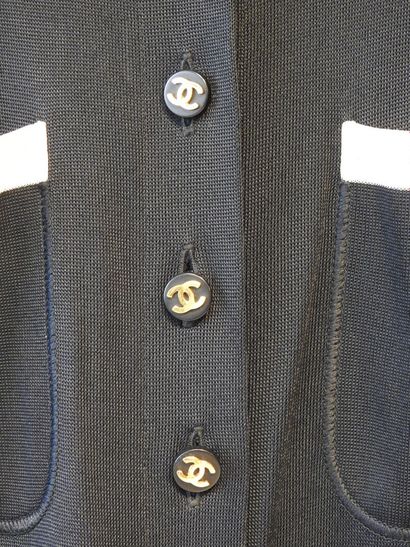 CHANEL Boutique
Long wool vest with 8 buttons...