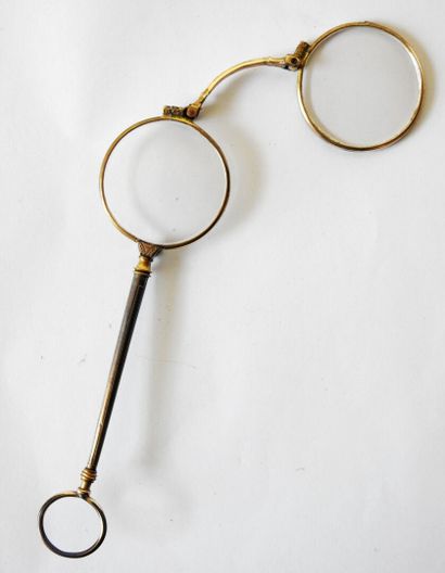Folding lorgnon in gilded metal and 14 k...