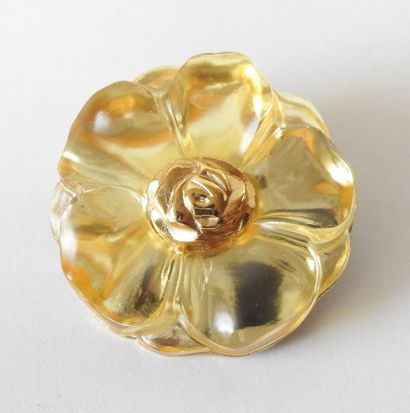 KENZO
Silver-plated metal and resin brooch...