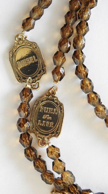 DIESEL
Long necklace with faceted brown resin...