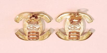 CHANEL
Pair of gold-plated metal ear clips,...