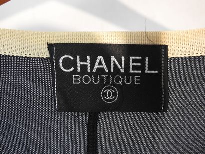 CHANEL Boutique
Long wool vest with 8 buttons...