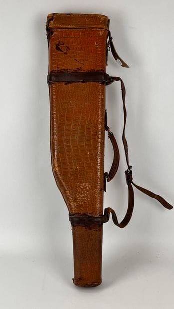 Etui jambon marron façon reptile. Long :...