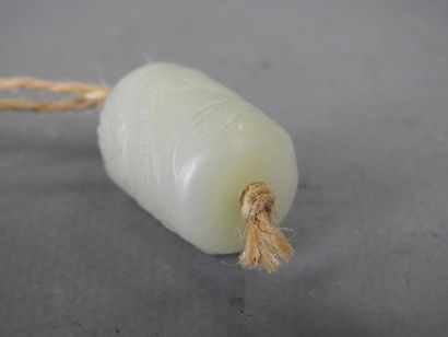 Jade pendant carved with a dragon. Height:...