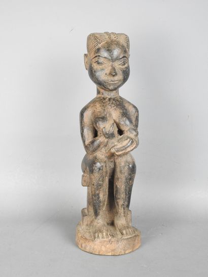 BAOULE, Ivory Coast: Maternity statue of...