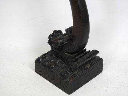 CHINA: Carved wood saddle, the zoomorphic...