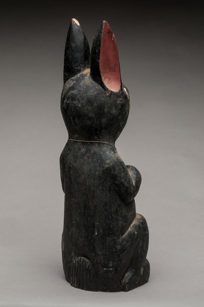 THAILAND.
Wooden votive statue carved with...