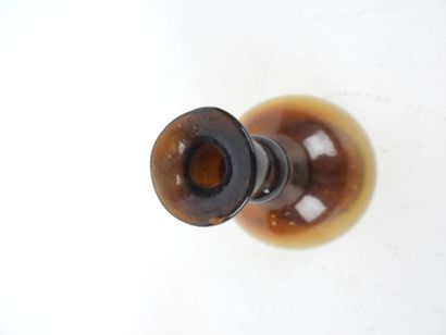 BALSAMAIRE in amber glass. H. 12 cm . Firing...