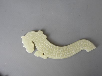 Three jade motifs (chimera or dragon). L...