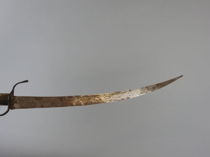 ALGERIA 
Three wooden short swords and scabbards...